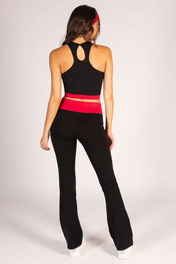 Red waistband flare trousers made out of cotton rich stretchy fabric to suit any low-impact workout.
