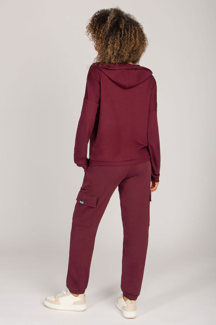 Burgundy women's loungewear hoodie with dipped hem