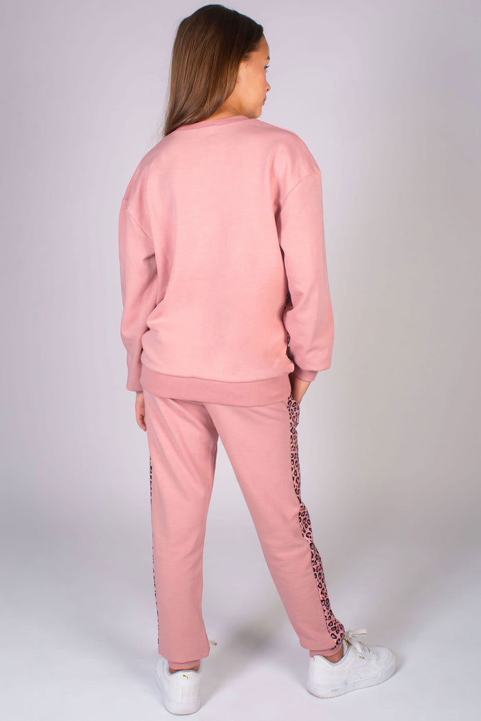 Pink leopard print joggers for kids paired with matching sweater by Pineapple Dance Studios