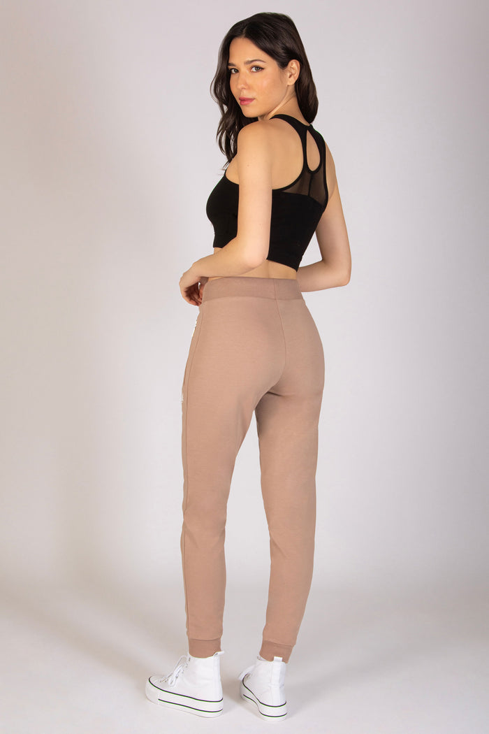 Martyna Balsam wearing mocha joggers for women designed by Pineapple Dance Studios.