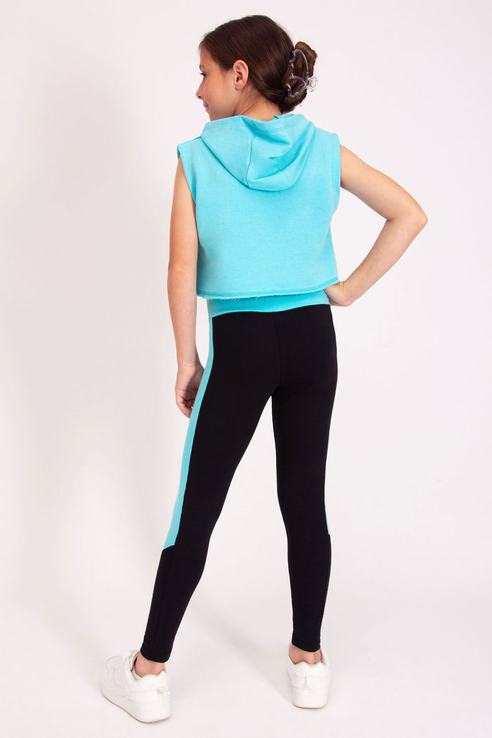 Girls' blue crop hoodie without sleeves worn with matching dance leggings