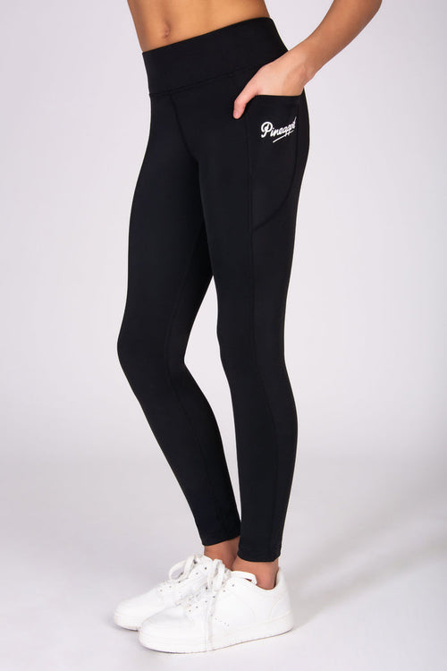 Black leggings with concealed side pockets on a white background