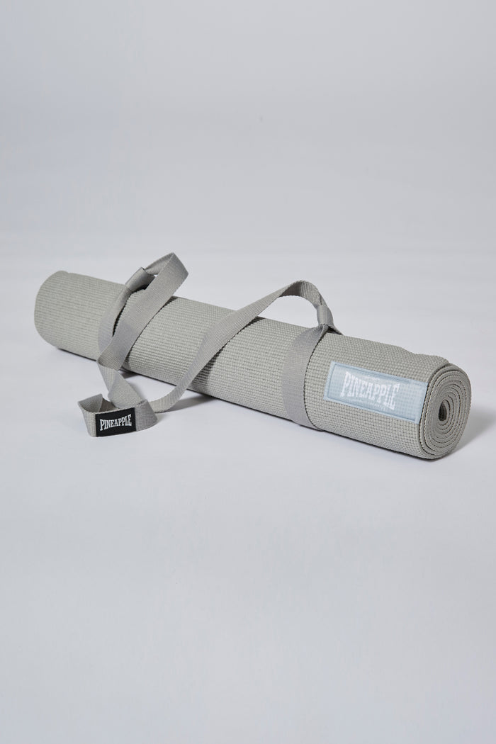 Rolled Grey Badge Yoga Mat