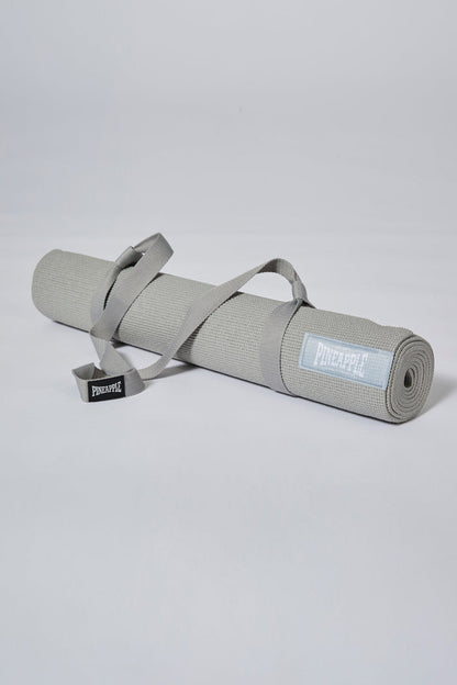 Rolled Grey Badge Yoga Mat