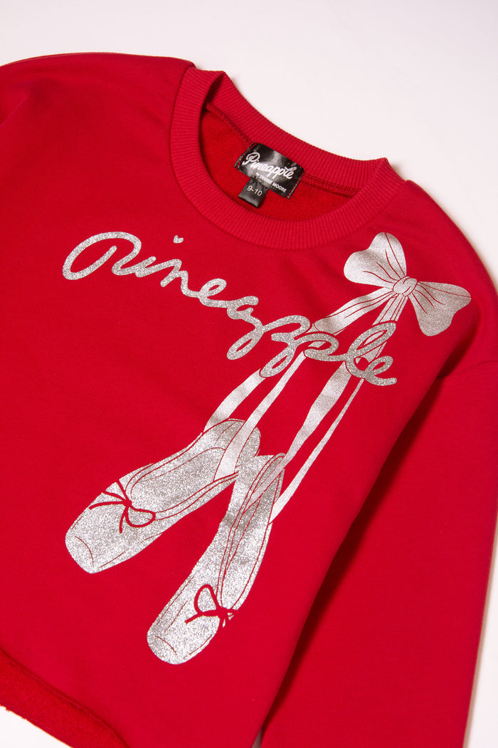 Red Christmas ballet sweater with ballet shoes and bow print in sparkly silver foil.