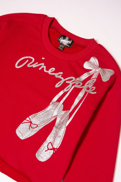 Red Christmas ballet sweater with ballet shoes and bow print in sparkly silver foil.