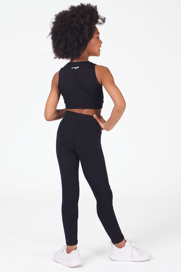 Girl wearing Black Band Leggings and black crop dance vest