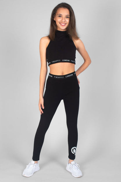 Girl wearing black Barbarella Crop Top and black Mesh Crop Leggings
