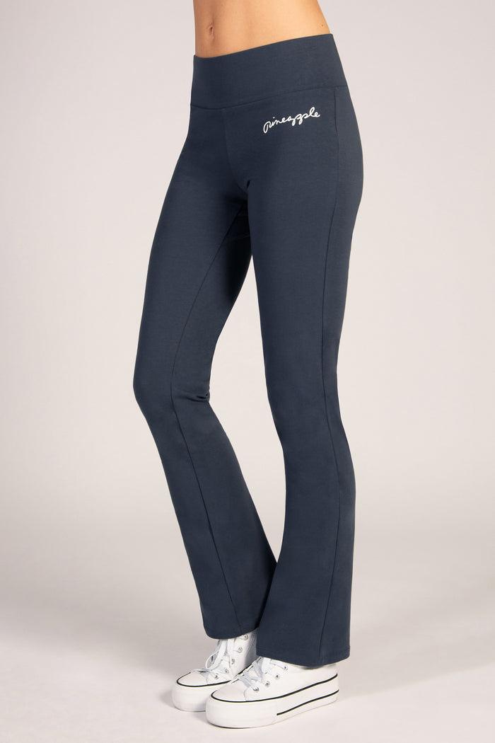Women's dark blue flared yoga leggings, designed to keep you comfortable yet supported during low impact workouts.