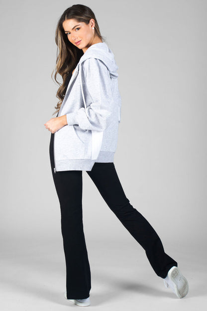 Woman wearing black Bootcut Jersey Trousers and grey hoodie