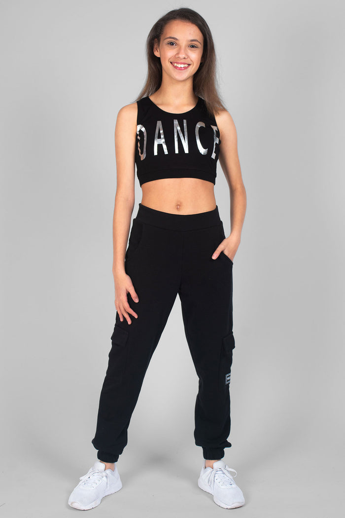 Girl wearing black Cargo Joggers and black Crop Dance Vest