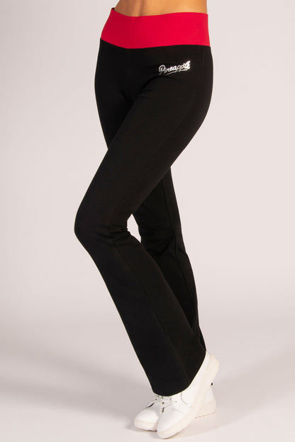 Women's black flared trousers with red elasticated waistband.