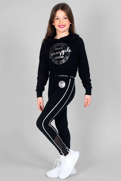 Girl wearing black Crop Hoodie and black Jacquard Piping Leggings with double stripes