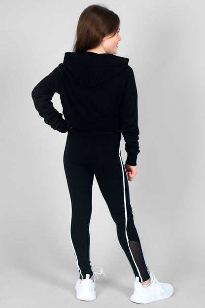 Girl wearing black Crop Hoodie and black Jacquard Piping Leggings with mesh panels