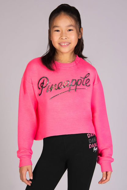 Girls' neon pink jumper with silver foil embossed logo across the chest