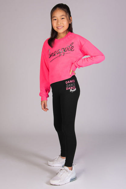 Bright pink winter top for girls paired with matching dance leggings by Pineapple Dance Studios