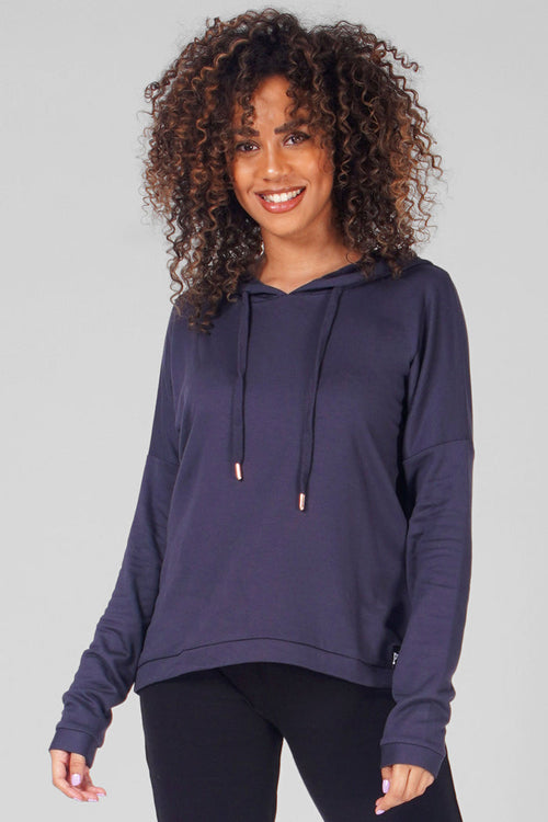 Woman wearing Pineapple Charcoal Dip Hem Hoodie