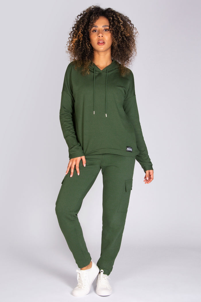 Alyce Justyne wearing Pineapple hoodie in khaki.