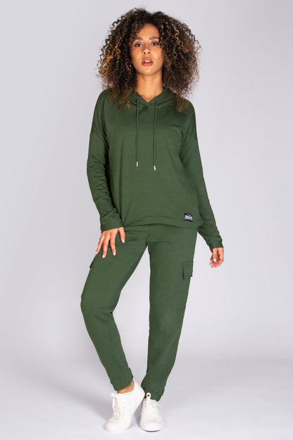 Alyce Justyne wearing Pineapple hoodie in khaki.