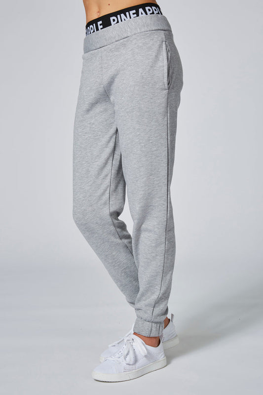 Girl wearing Pineapple Double Grey Track Pants