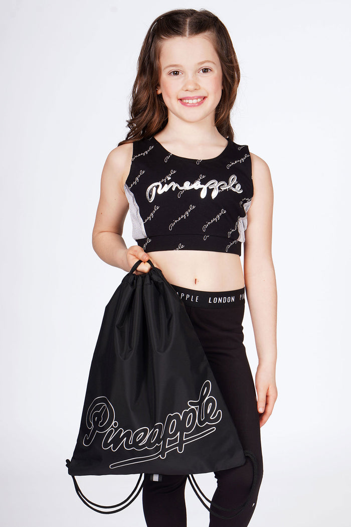 Girl carrying Pineapple Black Drawstring Bag