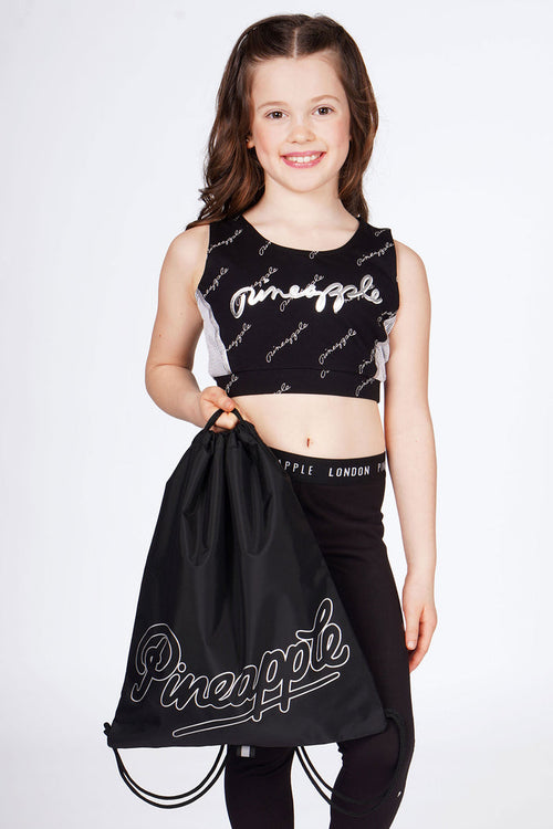 Girl carrying Pineapple Black Drawstring Bag
