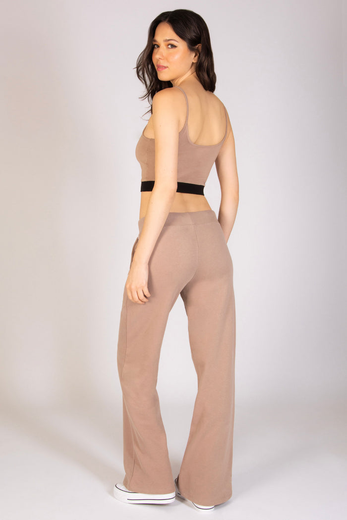 Martyna Balsam modelling for Pineapple Dance Studios wearing essential wide leg joggers for women