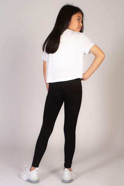 Kids' black leggings with folder waistband by Pineapple Dance Studios.