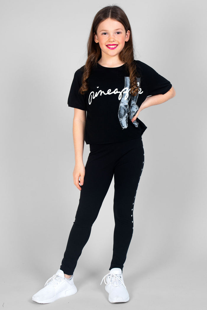 Girl wearing black Heart Stud Leggings and black Ballet Slouchy T-Shirt