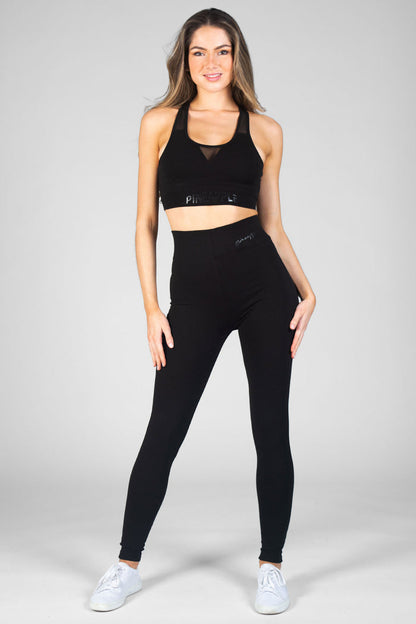 Woman wearing black High Waist Leggings and Mesh Bra Top