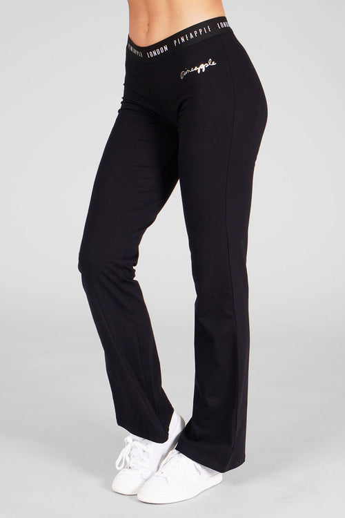 Woman wearing Pineapple Black Jacquard Band Jersey Trousers