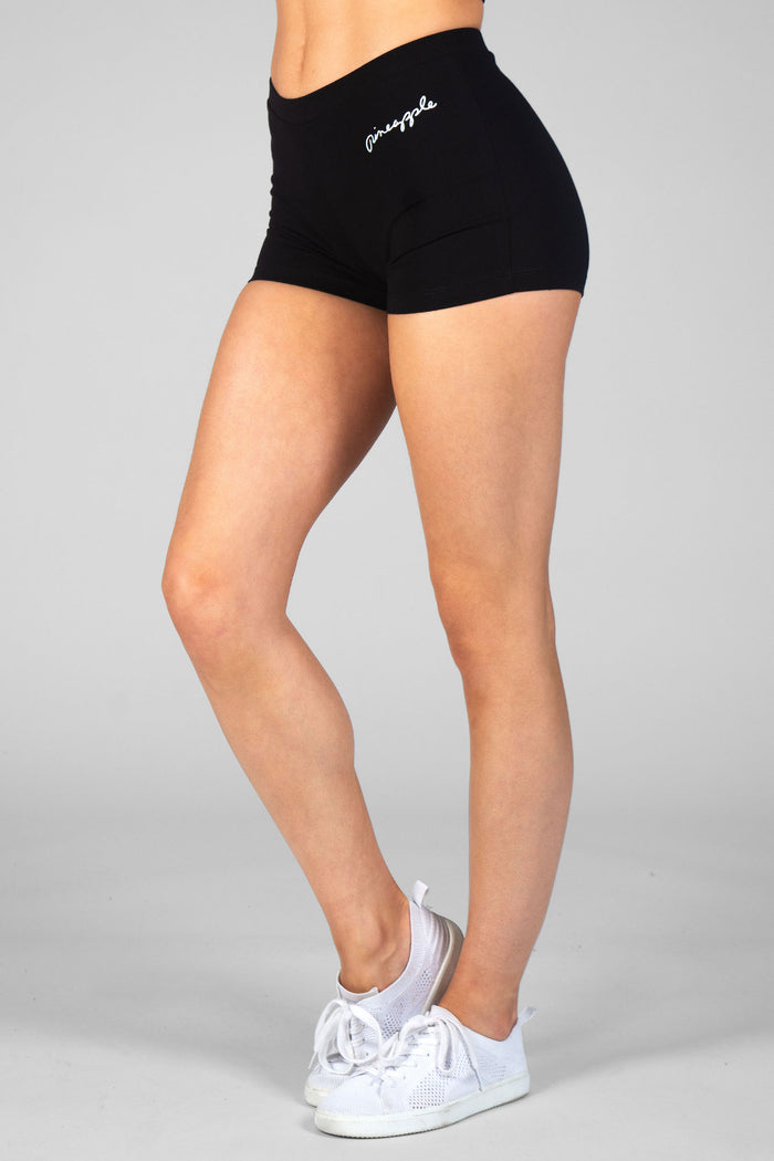 Woman wearing Pineapple black Classic Hot Pants