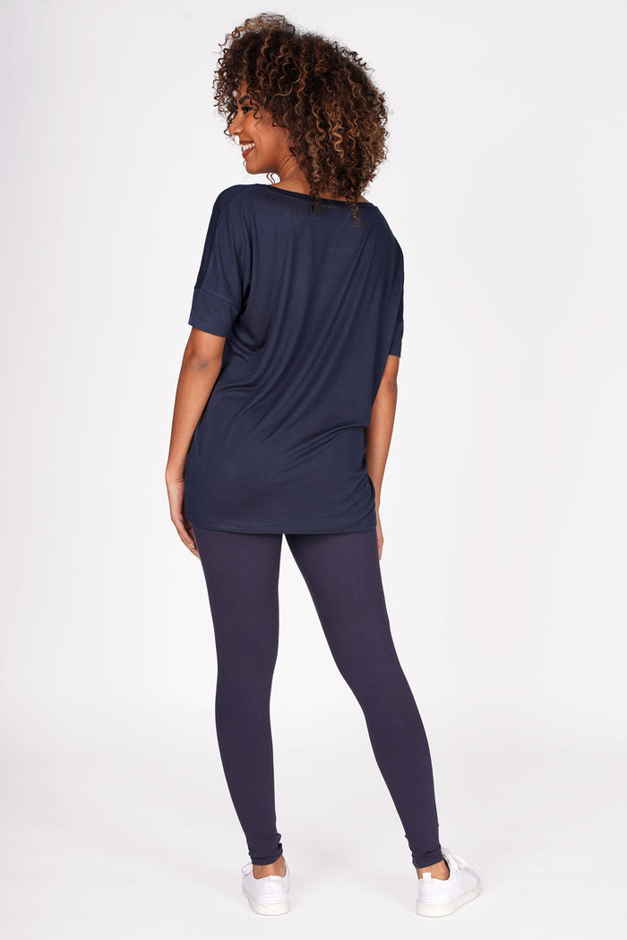 Woman wearing Charcoal Viscose T-Shirt and charcoal racer stripe leggings