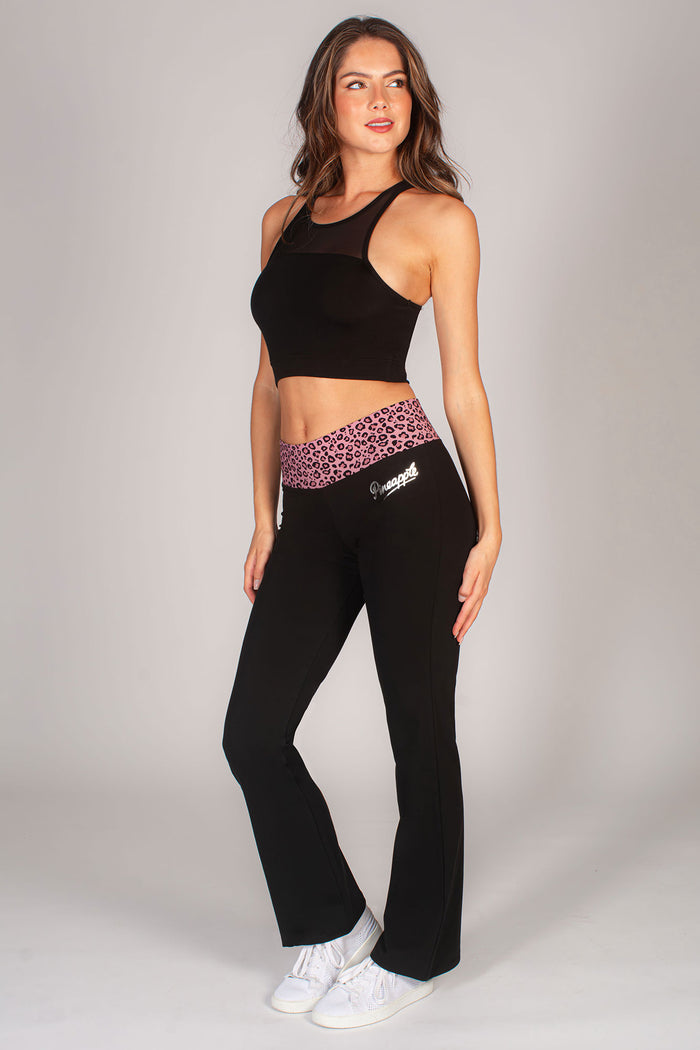The iconic Pineapple dance flared jersey trousers in black featuring a leopard print waistband