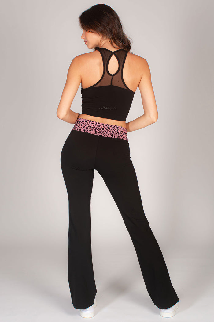 Women's flared jersey trousers with contrast leopard print waistband paired with black basic dance crop top