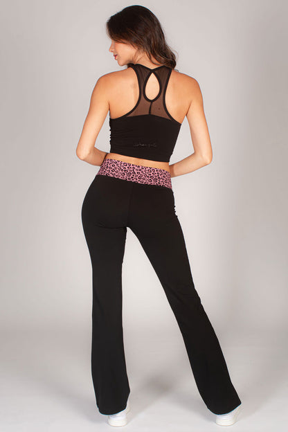 Women's flared jersey trousers with contrast leopard print waistband paired with black basic dance crop top
