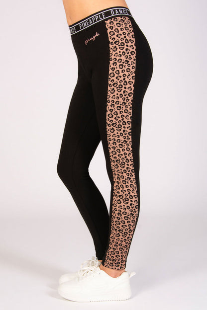 Kids' black dance leggings with brown leopard panelling and small foil Pineapple Dance Studios logo on the hip