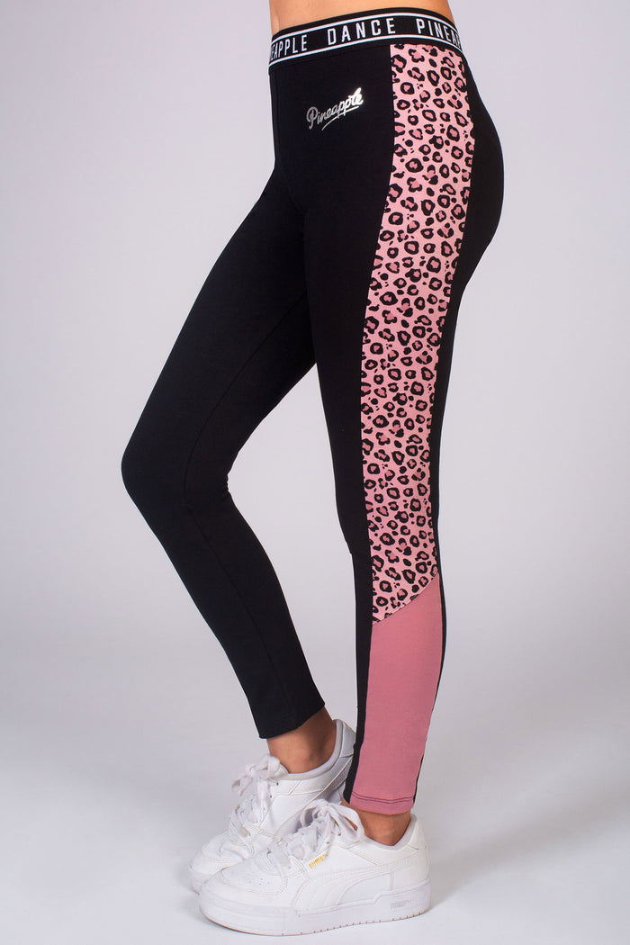 Black dance leggings for girls with pink leopard print paneling and dance print on elasticated waistband