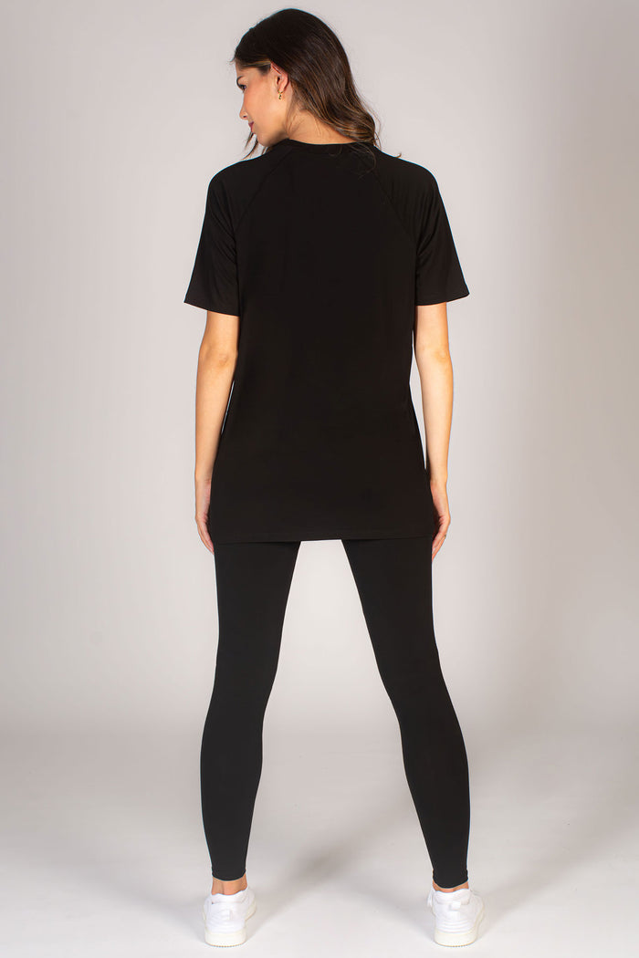 Women's basic black top paired with high waisted black leggings from Pineapple Dance Studios.