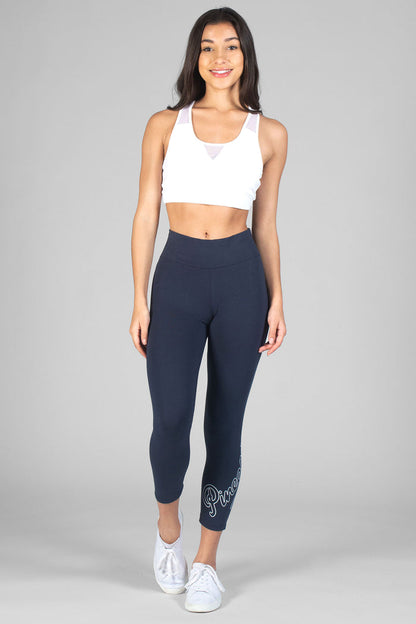 Woman wearing charcoal Logo Crop Leggings and white Mesh Bra Top