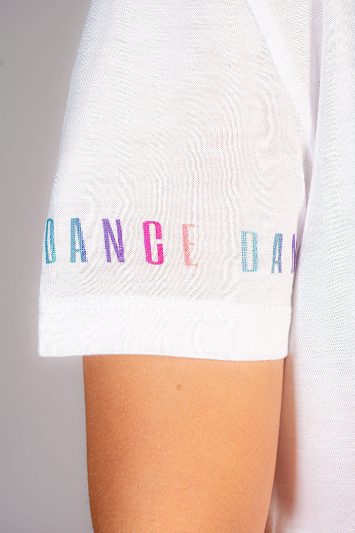 Detail of white crop t-shirt sleeve of dance rainbow print