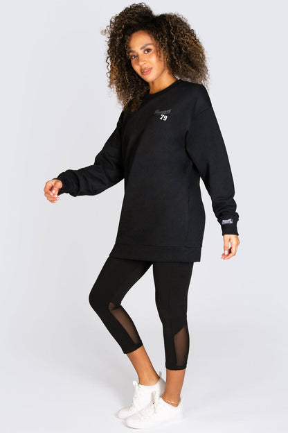 Alyce Justyne wearing Pineapple loungewear featuring an oversized sweat top in longline shape