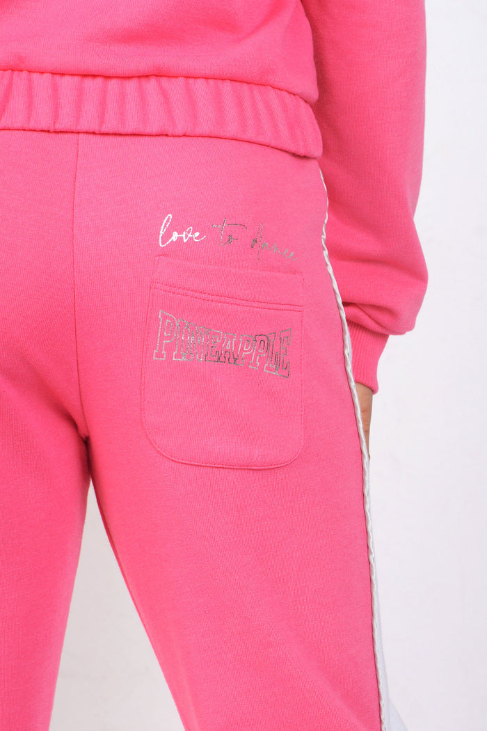 Print slogan and logo on back of Pink Panel Joggers