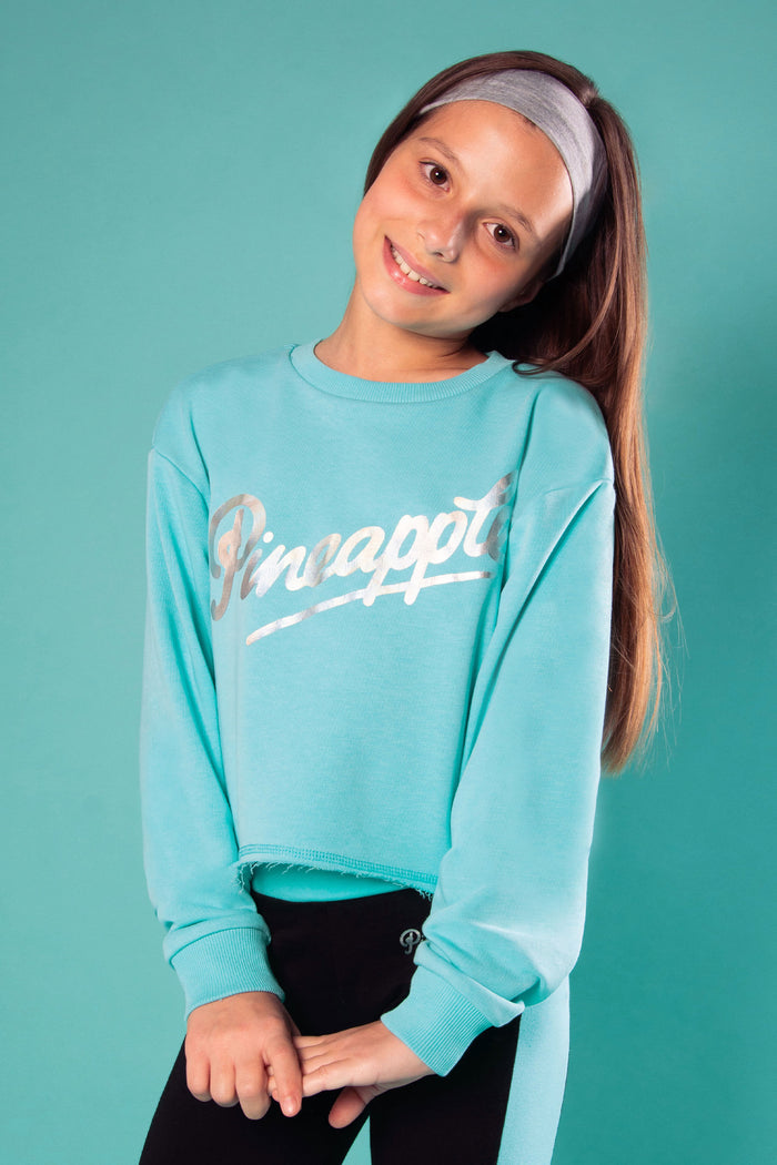 turquoise sweat top for kids with Pineapple Dance Studios silver foil chest print