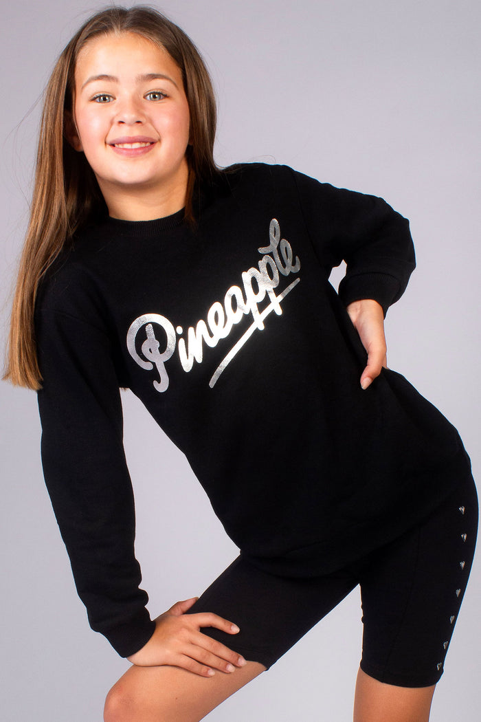 Basic black crewneck sweater for girls with silver foil print across the chest
