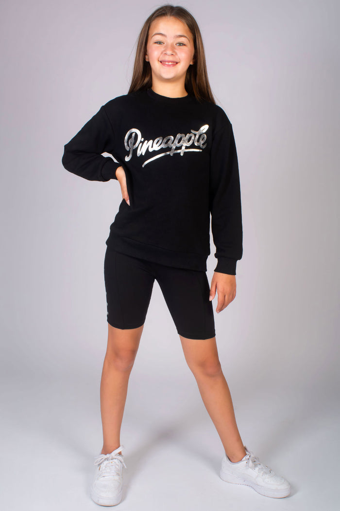 Girls' black dance outfit complete with black sweat top and heart stud cycling shorts