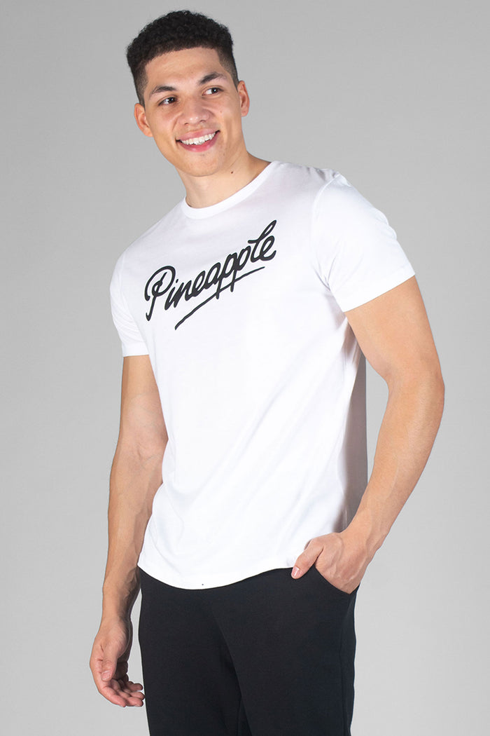 Man wearing white T-Shirt with black logo