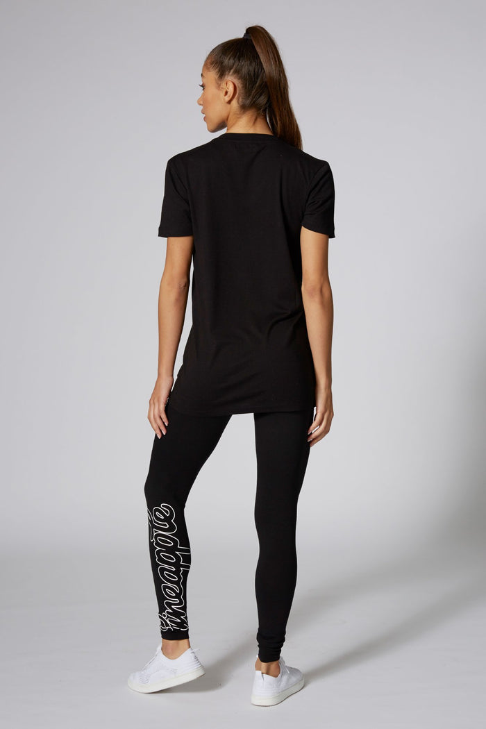 Woman wearing Pineapple Black Logo T-Shirt
