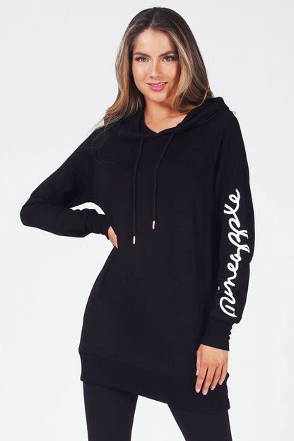 Woman wearing Black Longline Hoodie with white logo