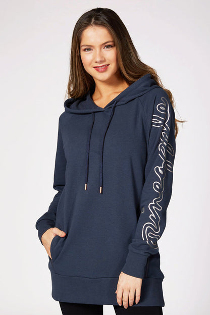 Kianna Louise wearing dark grey long hoodie designed by Debbie Moore